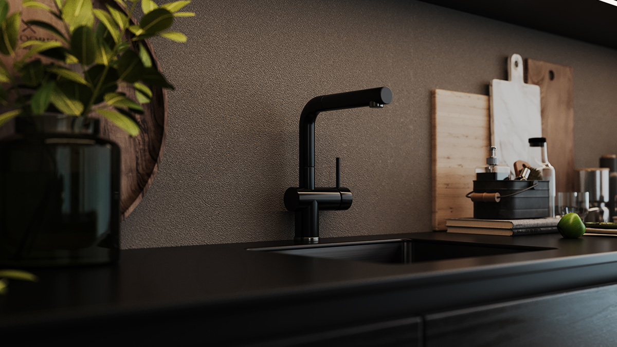 Küchenzeile mit schwarzen Armaturen und schwarzer Arbeitsplatte