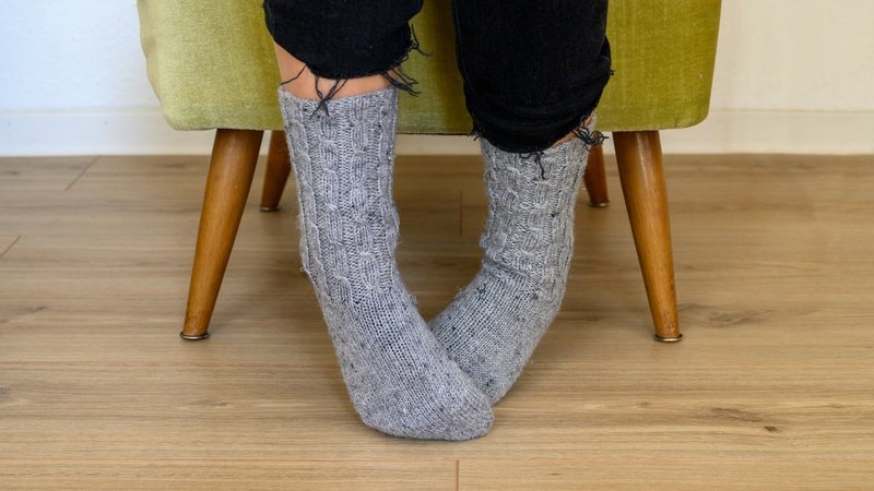 Fußbodenheizung kalte Füße, Füße mit Wollsocken