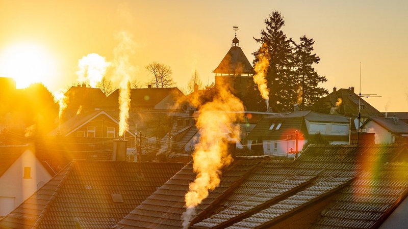 Heizungsart günstiger, rauchende Schornsteine